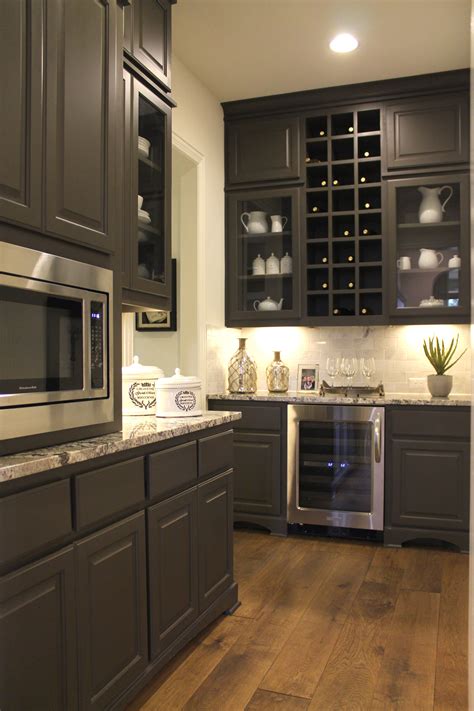 Check out our kitchen wine cabinet selection for the very best in unique or custom, handmade pieces from our console tables & cabinets shops. large pantry with cabinets - wine storage and glass doors