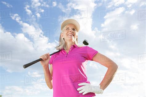 Caucasian Woman Holding Golf Club Stock Photo Dissolve