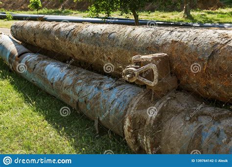 Tighten the clamps to seal the leak. Replacement Of Old Rusted Broken Metal Water Pipes With Modern Plastic Pipes. Plastic Pipes ...