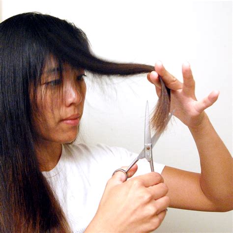 A Diy Layered Haircut How To Cut Your Hair At Home Recess