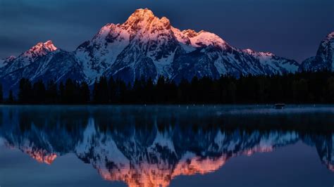 Download 1366x768 Mountains Reflection Lake Dawn Snowline Scenic