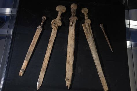 4 Exceptionally Preserved Roman Swords Discovered In A Dead Sea Cave In