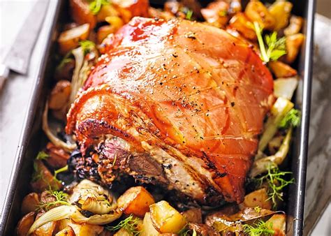 Brown pork on all sides; Roast pork belly with garlic potatoes recipe