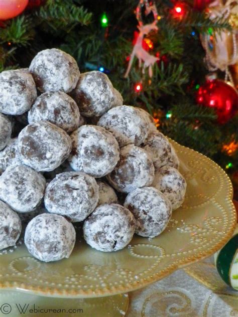 While eggnog gets a lot more press, hot buttered rum is the ultimate festive holiday drink. Spiced Rum Balls #SundaySupper | Webicurean