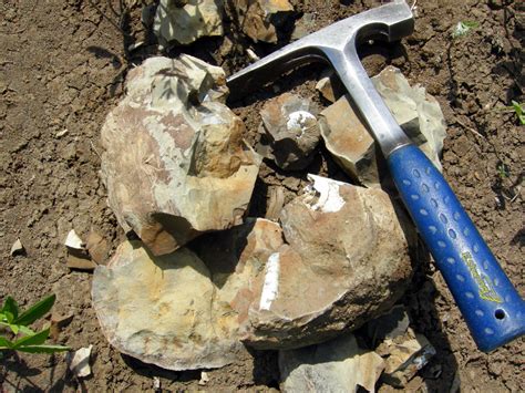 Hammer Helps Geologist Find The Story Behind The Rock Geology In