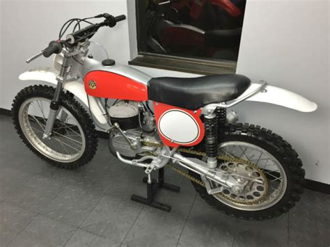 New barrel , sleeve , piston and rings standard bore gaskets. 1973 Bultaco 125 Pursang model 100 - Rare original one ...
