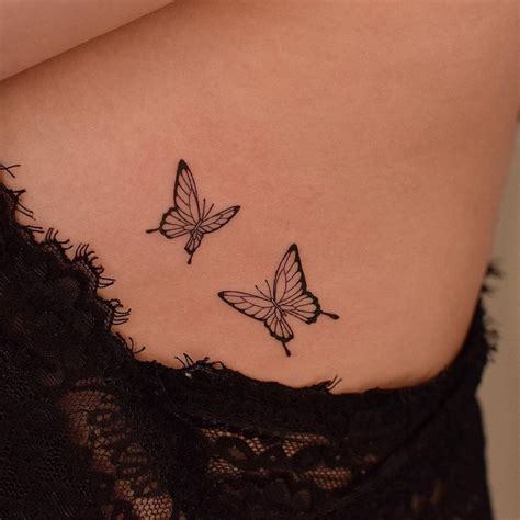 Fine Line Butterflies Tattooed On The Side Boob