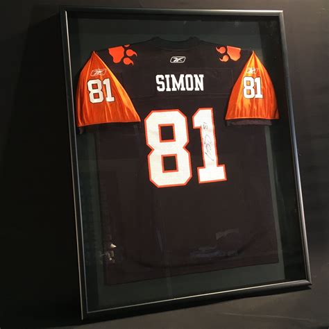 Check spelling or type a new query. GEROY SIMON AUTOGRAPHED AND FRAMED BC LIONS JERSEY