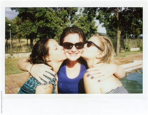 Girlfriends Kissing Their Best Friend In Sunglasses In Garden By Guille