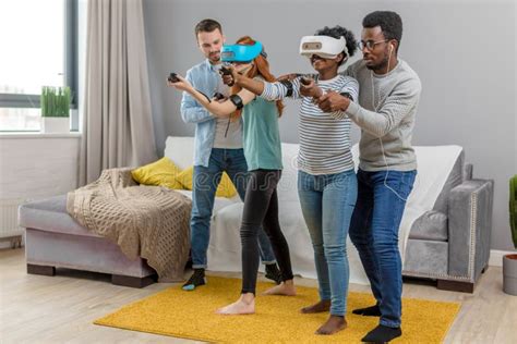 Multicultural Group Of Friends Playing Games Using Virtual Reality