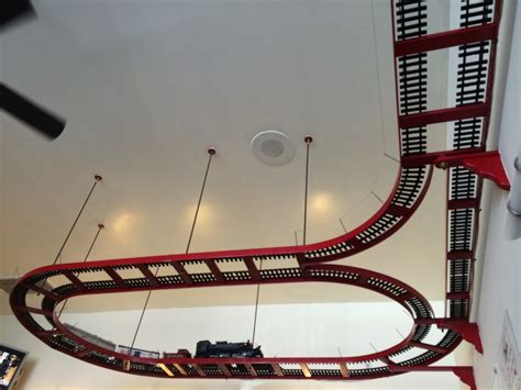 Curtain track rail bendable straight curve hanging ceiling mount shower window. This restaurant has a train set with tracks hanging from ...
