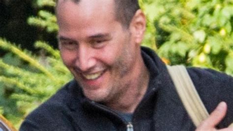 Keanu Reeves Spotted With A Shaved Head In Berlin Photos