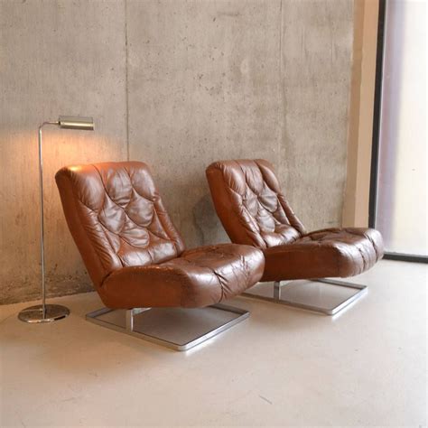 mid century leather chairs possibly by percival lafer by proper