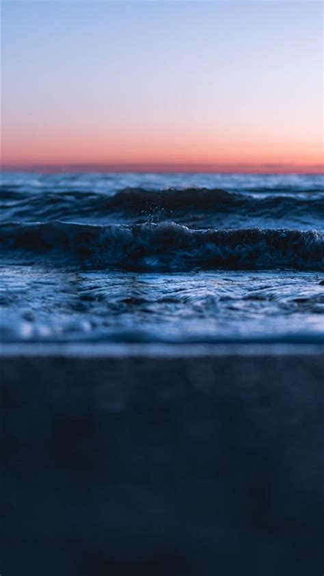Ocean Waves Crashing On Shore During Sunset Iphone Wallpapers Free Download