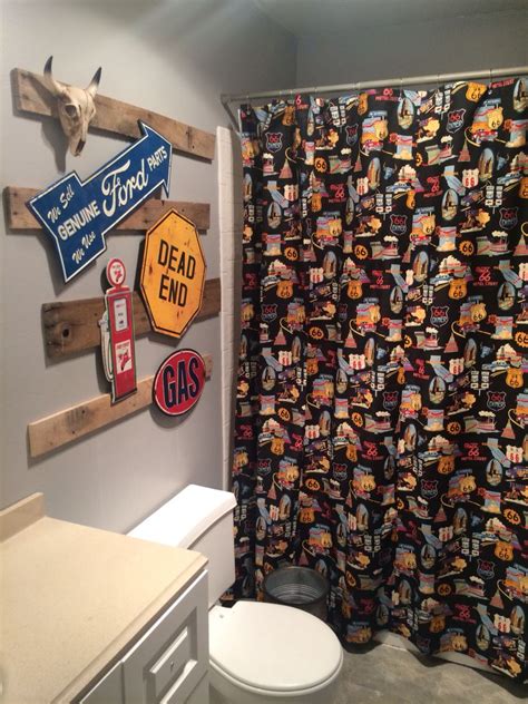 The brand mixes classic americana style with a contemporary twist. Route 66 bathroom decor | Mens bathroom decor, Boys ...