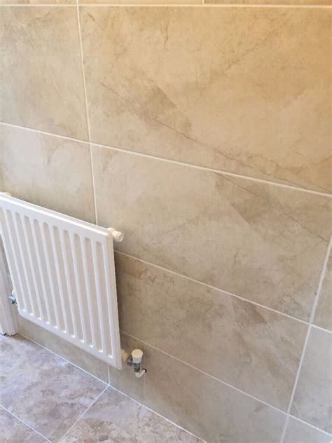 Calacatta white porcelain wall & floor tile 300 x 600mm. Wickes Onyx Beige Gloss Stone Effect Ceramic Wall & Floor ...