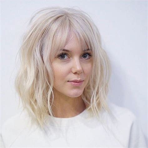 Layered bob with curtain fringe. Long Platinum Bob with Wavy Fringe and Parted Bangs - The ...