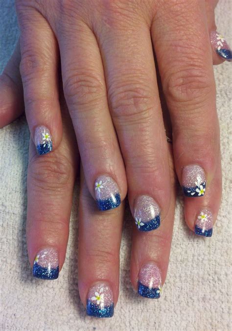 Blue acrylic with white flowers | Blue nail designs, Blue nail art