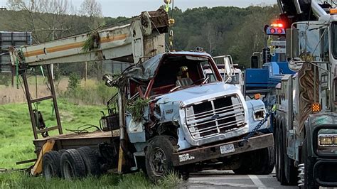 Logging Truck Overturns In Crash With Passenger Car Driver Rushed To