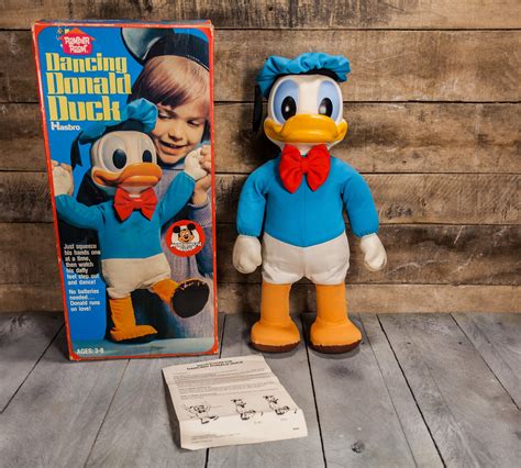 Set Of Two Vintage Plastic Disney Donald Duck Toys Of Donald Playing A