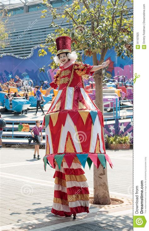Clown On Stilts Greets Visitors To The Attractions Park Editorial Image