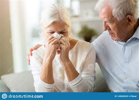 Senior Man Comforting His Crying Wife At Home Stock Image Image Of