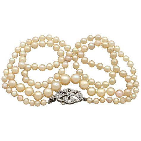 BUCCELLATI Two Strand Pearl Necklace With Gold And Diamond Clasp At StDibs