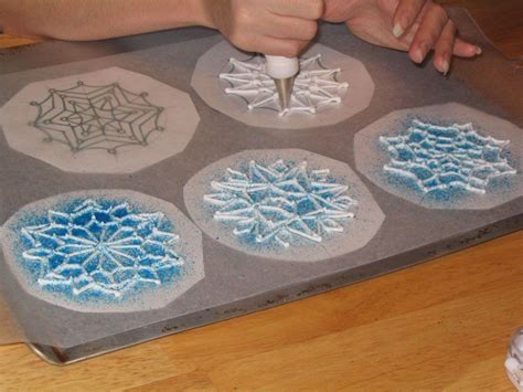 The most common royal icing decorations material is metal. Dreaming Wedding Cake: Blue and white Snowflake Garnish ...