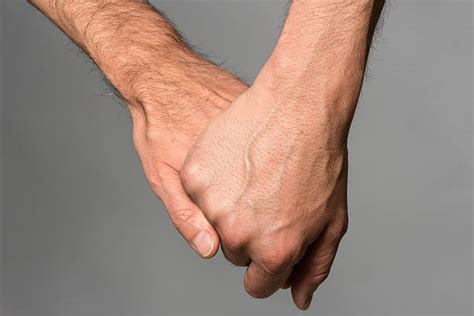 Gay Men Holding Hands Stock Photos Pictures And Royalty Free Images Istock