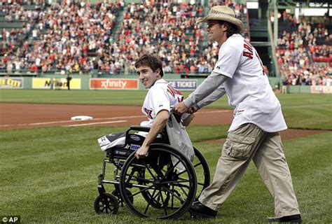 Boston Marathon Victim Jeff Bauman Is Joined By The Man Who Rescued Him After Bombings To Throw