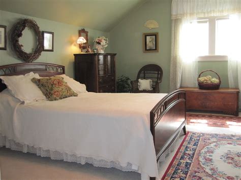 Tackle a cream room with gusto, and choose everything in differing cream tones, from the bedding, sheets, cushions and pillows through to accessories like vases, books and even rattan furniture. Vintage bedroom with green walls and cream bedding in ...