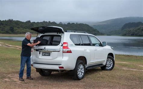 The base trim starts at $34,600, while the 4runner beings at $36,120. Comparison - Toyota Highlander LE 2017 - vs - Toyota Land Cruiser Prado GX 2017 | SUV Drive