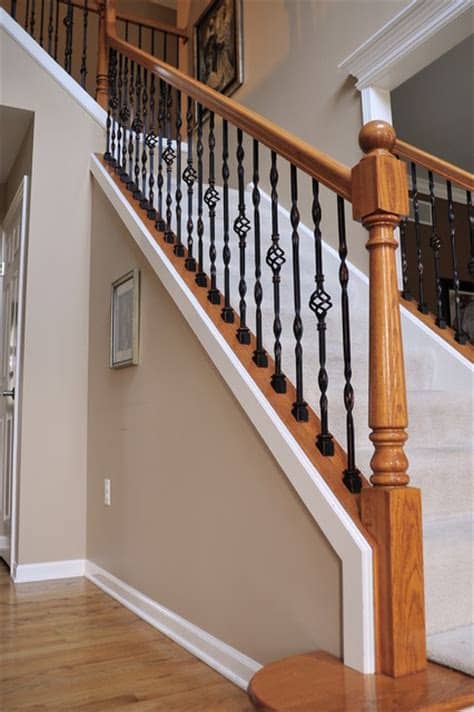 Purchasing a stair railing is a fairly involved design decision. IRON BALUSTER UPGRADE