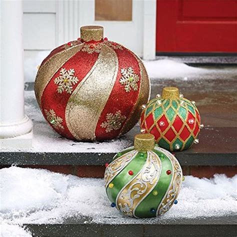 These bright, bold accents look like giant glossy versions of glass christmas tree ornaments, down to their gold tops, but they're made of sturdy resin. 54 Best DIY Christmas Light Balls For Outdoor Decoration ...