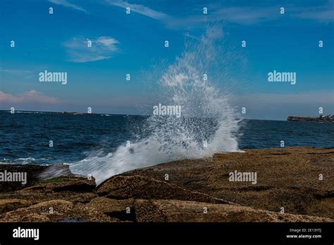 The Wave Hitting On The Rocks Stock Photo Alamy