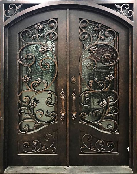The overall look is a sophisticated and elegant wall of windows. Wrought Iron Door EL1047 - Monarch Custom Doors | Wrought ...