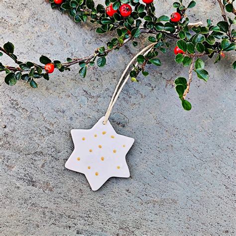 White Star Christmas Ornaments Handmade From Clay And Painted With Gold