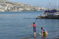 saranda fishing bay ozoutback albania ionian sea boys
