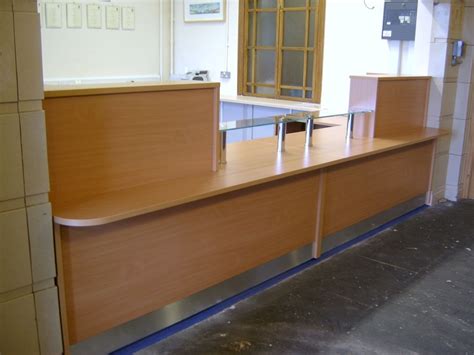 Bottom line, lounge furniture has to work hard and facilitate a lot of different needs. Installed in a High School in Morcambe this bespoke reception desk is finished in Beech ...