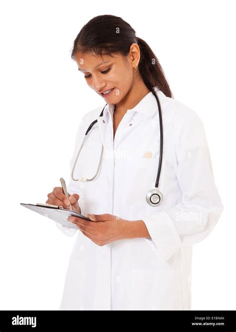 Indian Physician Writing On Clipboard Stock Photo Alamy