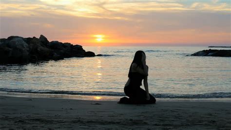Lonely Woman Crying Sitting On Beach During Sunset Sad And Depresed