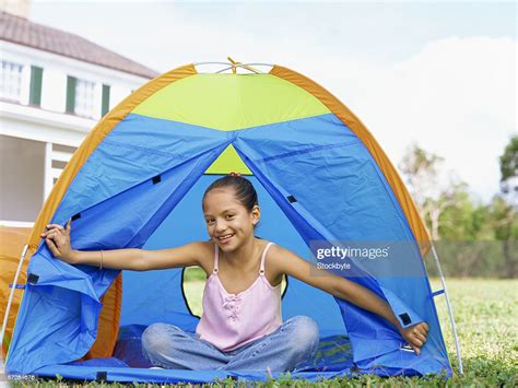 Young Girl Sitting In A Tent Photo Getty Images