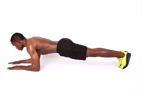 Fitness Man Doing Plank Exercise Workout