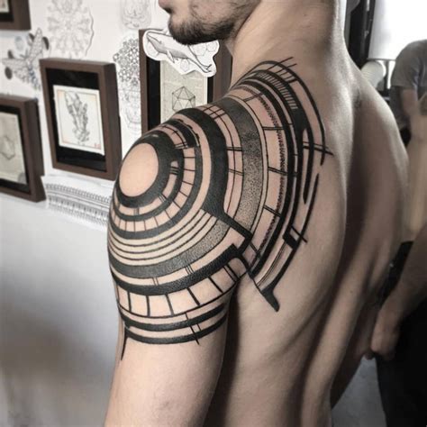 Geometric Tattoo On The Left Shoulder