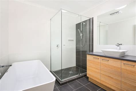 Modern Bathroom With Freestanding Bath Semi Frameless Shower Screen