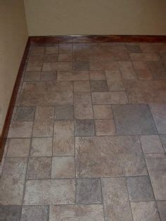 Stone look vinyl flooring is a type of vinyl flooring that resembles stones like granite, terrazzo, or even concrete with craftsman dappling and striations built into the tiles. Pergo Stone Look Laminate Flooring - Walesfootprint.org - Walesfootprint.org