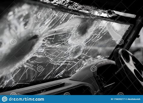 Bullet Hole On A Car Windshield Car Window After A Raid Has A Bullet
