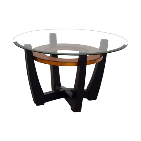 The right coffee table will serve you and your family for years to come. 84% OFF - Macy's Elation Round Glass & Wood Coffee Table ...