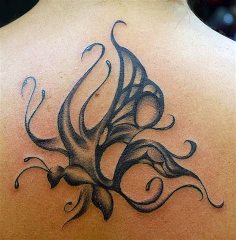 Swirly Tribal Monarch Butterfly Tattoo Art Symbol Design For Women