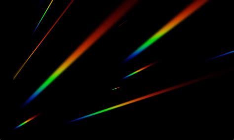 The Rainbow Light Scattered On A Black Background The Blurry Abstract